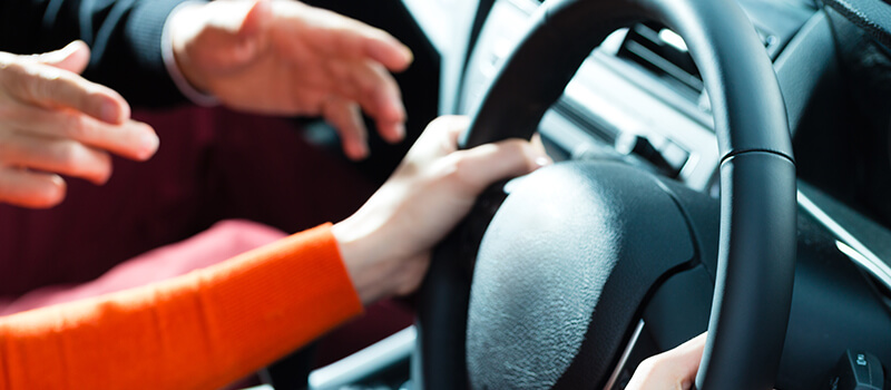 hands on steering wheel